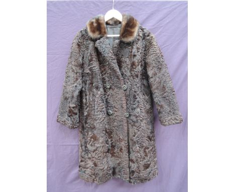 A lady's vintage dark brown curly lamb full length coat with mink trimmed collar