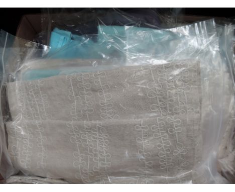 A box of mixed vintage linen including tray cloths, tablecloths, bed linen etc
