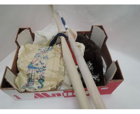 A small selection of vintage items including baby's gown, beaded bags, leather hat, Chinese embroidered panel etc