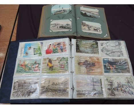 Two postcard albums, modern and vintage includes good cards