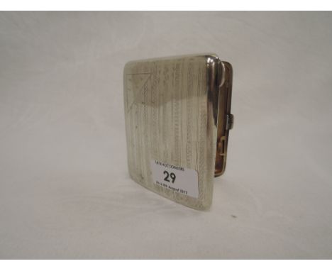 A silver cigarette case having engine turned decoration and plain cartouche, Birmingham 1930, W H Haseler Ltd