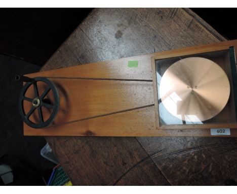 A vintage Philip Harris demonstration model of Arago's Disk