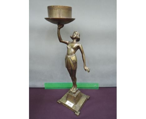 A Spelter Art Deco table lamp figure modelled as stylised topless lady