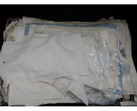 A small selection of vintage damask linen, embroidered tray cloths, napkins, linen bags etc