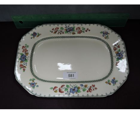 A Spode part dinner service in the floral Royal Jasmine pattern on cream ground