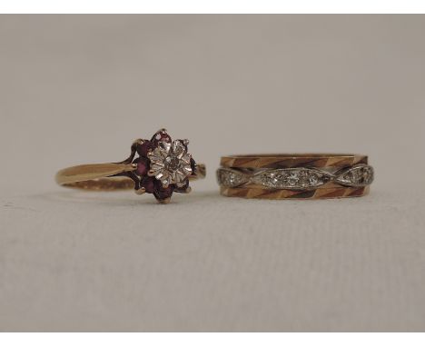 A lady's dress ring having a ruby and diamond cluster on a 9ct gold loop, and a 9ct gold eternity ring having cubic zirconia 