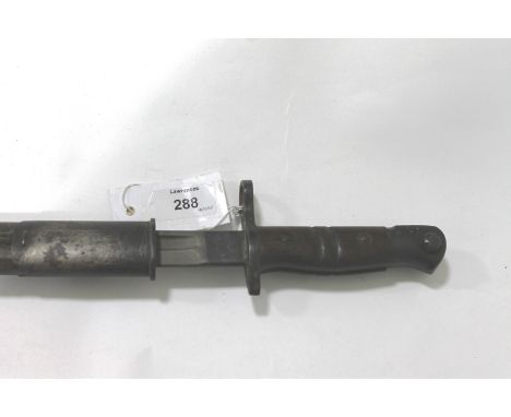 A USA 1913 BAYONET & SCABBARD. A USA 1913 model Remington bayonet complete with steel and leather scabbard, marked 1913/17.