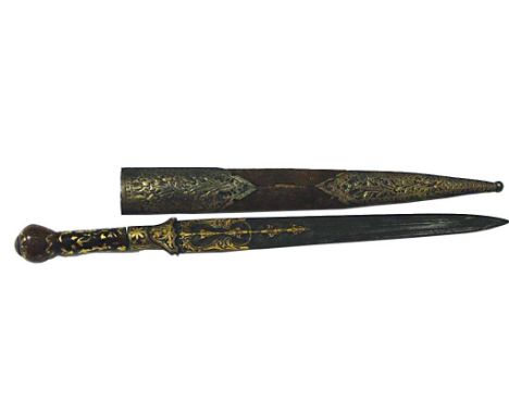 AN TURKISH DAGGER. An eastern dagger with much gold decoration, including on the stone pommel and hilt. A well made multi-ful