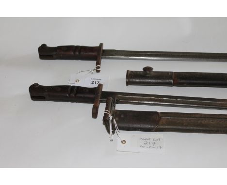 TWO GT WAR BAYONETS. The first complete with its scabbard and marked Remington 1913, on the blade of 16.1/2". The second agai