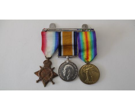 AN OFFICERS TRIO TO A SUSSEX CRICKETER. A 1914 Star named to Lt K Harding RFA. British War & Victory Medals named to Lt K Har