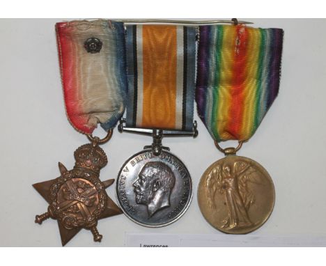 A 2nd BEDFORDSHIRE REGT GT WAR 1914 STAR TRIO. A 1914 Star with rosette affixed, named to 4-6852 Pte F McGill 2/ Bedf/R. Brit