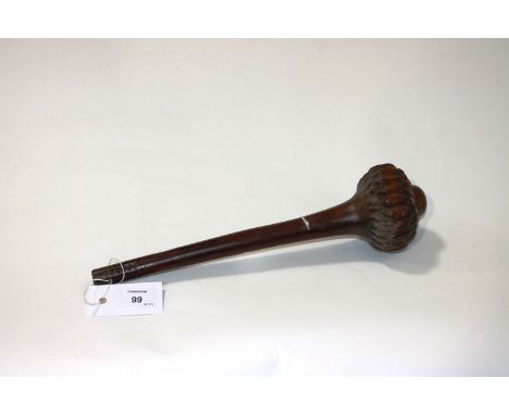 A FIJIAN ULA CLUB etc A Fijian Ula club with bulbous sectioned head, 13.1/2" long in a native hardwood. Also a knurled staff 