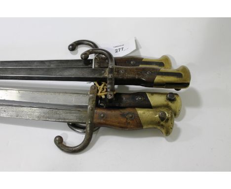 FOUR FRENCH BAYONETS. Four French model 1874 pattern bayonets lacking scabbards, dated 1877 x 2 & 1879, the last undated. 