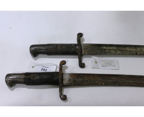 TWO 1856 PATTERN BAYONETS Two 1856 pattern sword bayonets with various issue marks, both lack a scabbard.