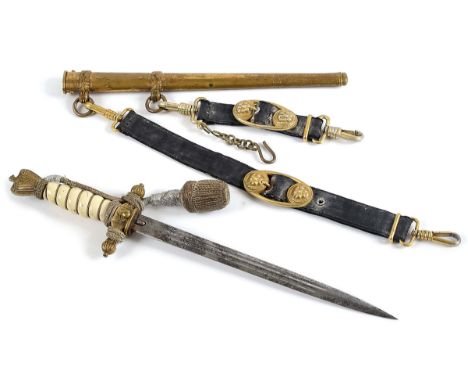 A KREIGSMARINE OFFICERS DAGGER. A German naval officers dagger, complete with swordknot and hangers. Marked E & F Horster Sol