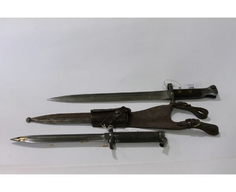 A LEE-METFORD AND A 1896 SWEDISH KNIFE BAYONET. A Swedish 1896 model knife bayonet with single-edged 8.1/4" blade, bearing ma