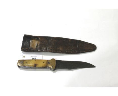 A SKINNING KNIFE & SCABBARD. A 19thC style Skinning knife with bone grips, 4.3/4" blade, overall length 9.1/2". It would appe