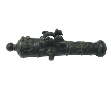 A MODEL OF A SPANISH SHIPS CANNON. A very ornate cannon modelled on those used on primarily Spanish Galleons, with the animal