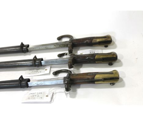 THREE FRENCH BAYONETS & SCABBARDS. Three French model 1874 Epee bayonets, complete with steel scabbards. Three different arse
