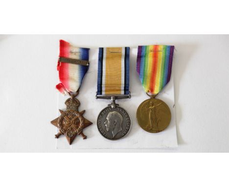 A 1914 Star/Bar TRIO TO A WILTSHIRE REGT 1914 PRISONER OF WAR. A 1914 Star and Bar, British War & Victory Medals named to 770