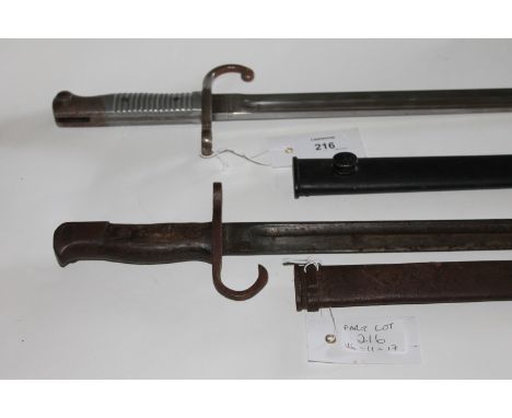 AN ARGENTINIAN BAYONET & SCABBARD & AN ARISAKA BAYONET.. An Argentinian 1891 model bayonet and scabbard, with makers mark for