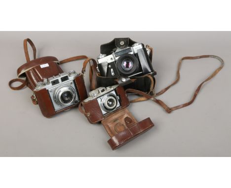 Three vintage cameras to include Balda, Agfa Karrat and Zenith.