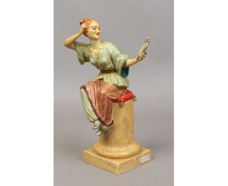 A Royal Worcester figure 'le miroir' modelled by A. Azori and decorated in cellulose glazes.