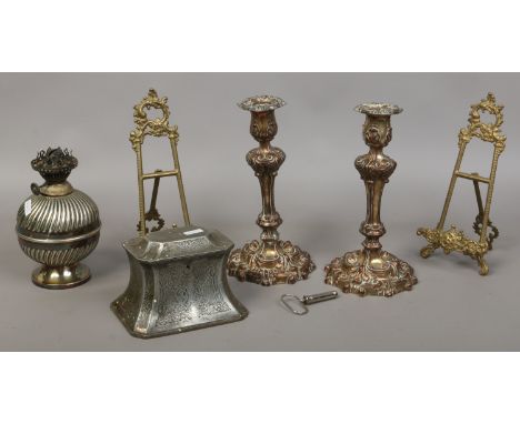 A collection of silver plate and metalwares including globular oil lamp base, old Sheffield plate candlesticks, cruet set and