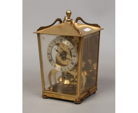 A brass cased Tortion clock by Aug Schatz & Sohne Germany.