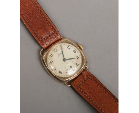 A gentlemans vintage 9ct gold Record manual wristwatch with subsidiary seconds, running
