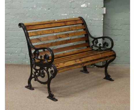 A good quality cast iron two seat garden bench.