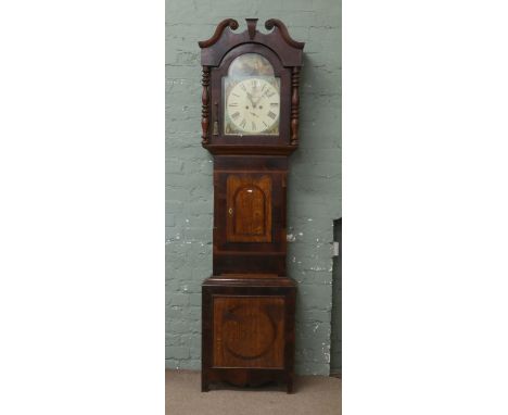 A Victorian oak and mahogany eight day longcase clock with painted arch top dial.