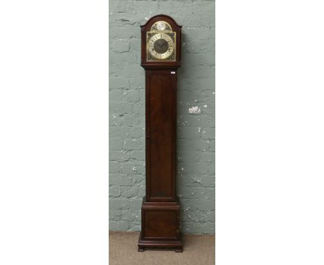 A mahogany cased grandmother clock with Westminster chime.