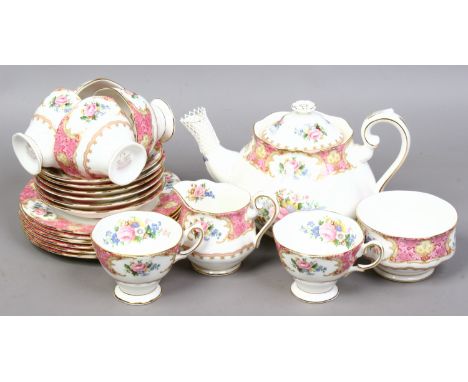 A Royal Albert six place teaset including teapot. Decorated in the Lady Caryle pattern.