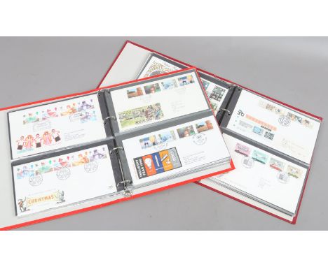 Two folders of Post Office first day covers covering wild flower, British birds, famous people, British theatre, British text