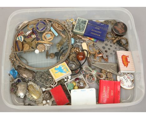A tray of costume jewellery and collectables including enamelled badges and medals, decanter labels and vintage matches etc.