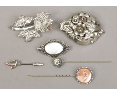 Three silver brooches and three silver pins one set with a portrait miniature of a terrier 