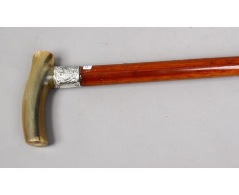 A horn handle walking stick with silver collar assayed London 1900.
