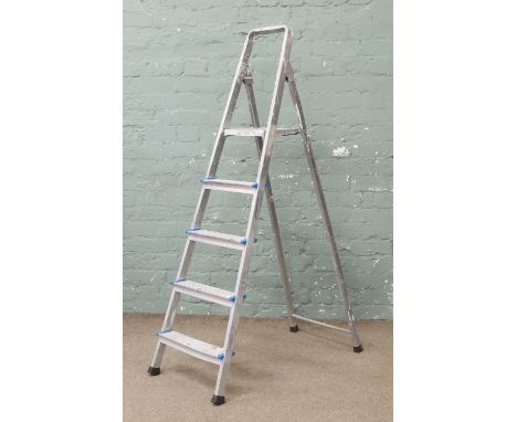 A pair of aluminium step ladders.