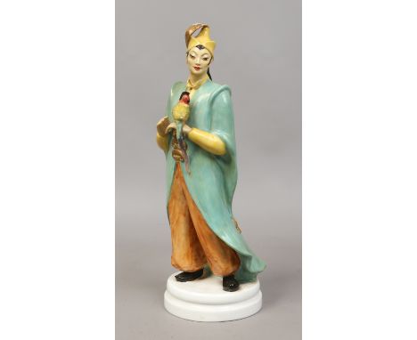A china figure formed as an Arabian maiden and decorated in cellulose glaze possibly Royal Worcester.