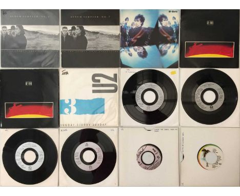 U2 - 7" PACK. A quality pack of 23 7" singles by U2. Titles include The Joshua Tree Collection inc: Album Sampler No.1 (U2 6-