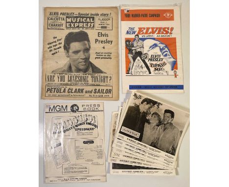 An NME magazine (Jan 27th 1961) with Elvis cover, eight 8x10" Flaming Star stills and two film press books for 'Tickle Me' an