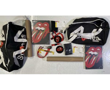 Two Rolling Stones duffel bags, and contents of one bag inc book, lanyards etc
