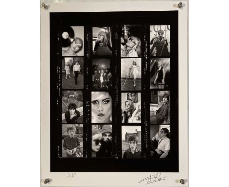 A high-quality archival print of images by Martyn Goddard depicting Blondie in NYC and London, 1978. Measures 20 x 16". 5/10.