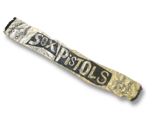 A tasselled satin or satin effect scarf, likely c late 1970s and possibly issued at Sex Pistols concerts during the period. W