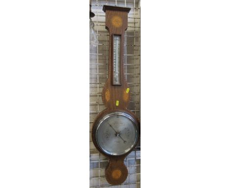 James Lucking &amp; Co. a mahogany and satinwood banjo barometer, with silvered dials