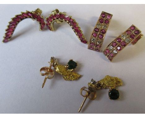 Three pairs of earrings, to include a pair of gold coloured nuggets set with a green stone and small diamond, a pair of ruby 