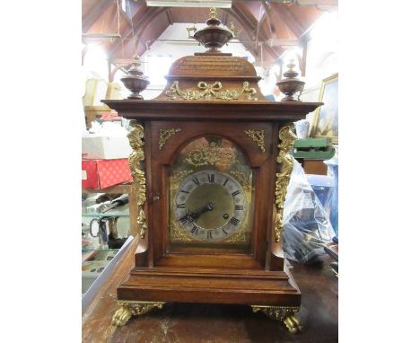 A mahogany bracket clock, with applied gilt mounts, total height 22ins, width 13ins