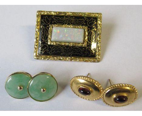 A Victorian rectangular brooch, set with an opal, to a gilt and black frame, 1.25ins x 1ins, together with a pair of jade and