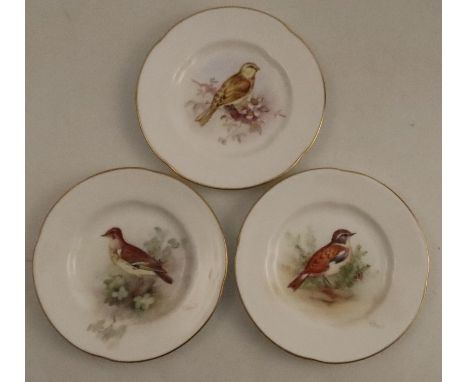 Three&nbsp;Royal Worcester small plates, decorated with a Wood Lark, a Yellow Hammer and a Whinchat by W Powell, one not sign